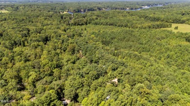 FIVE CAMP LOTS COMBINED INTO ONE BEAUTIFUL LAKE RETREAT!! One on River Golf and Country Club at Lake Royale in North Carolina - for sale on GolfHomes.com, golf home, golf lot