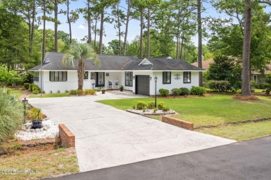This delightful residence seamlessly blends style and comfort on Carolina Shores Golf Course in North Carolina - for sale on GolfHomes.com, golf home, golf lot