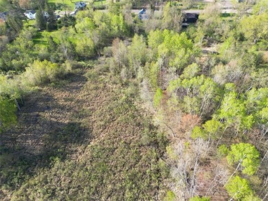 Discover the perfect blend of seclusion and convenience with on Sandstone Area Country Club in Minnesota - for sale on GolfHomes.com, golf home, golf lot