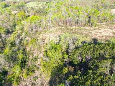 Discover the perfect blend of seclusion and convenience with on Sandstone Area Country Club in Minnesota - for sale on GolfHomes.com, golf home, golf lot