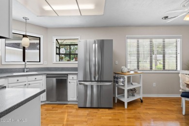 This delightful residence seamlessly blends style and comfort on Carolina Shores Golf Course in North Carolina - for sale on GolfHomes.com, golf home, golf lot