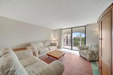 SPACIOUS 2/2 PENTHOUSE CORNER UNIT IN MANICURED 55+ LAKES OF on Inverrary Country Club in Florida - for sale on GolfHomes.com, golf home, golf lot
