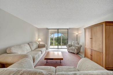 SPACIOUS 2/2 PENTHOUSE CORNER UNIT IN MANICURED 55+ LAKES OF on Inverrary Country Club in Florida - for sale on GolfHomes.com, golf home, golf lot