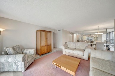 SPACIOUS 2/2 PENTHOUSE CORNER UNIT IN MANICURED 55+ LAKES OF on Inverrary Country Club in Florida - for sale on GolfHomes.com, golf home, golf lot
