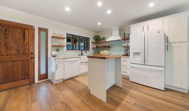 This Hawaiian plantation-style home is located in the on Kiahuna Golf Club in Hawaii - for sale on GolfHomes.com, golf home, golf lot