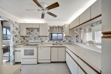 SPACIOUS 2/2 PENTHOUSE CORNER UNIT IN MANICURED 55+ LAKES OF on Inverrary Country Club in Florida - for sale on GolfHomes.com, golf home, golf lot