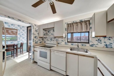 SPACIOUS 2/2 PENTHOUSE CORNER UNIT IN MANICURED 55+ LAKES OF on Inverrary Country Club in Florida - for sale on GolfHomes.com, golf home, golf lot