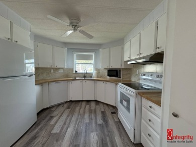 BEAUTIFULLY RENOVATED 2 BED, 2 BATH HOME LOCATED 7 MILES FROM on Rolling Green Golf Course in Florida - for sale on GolfHomes.com, golf home, golf lot