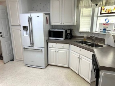 This beautifully maintained 2-bedroom, 2-bathroom home is being on Crystal Lake Club in Florida - for sale on GolfHomes.com, golf home, golf lot