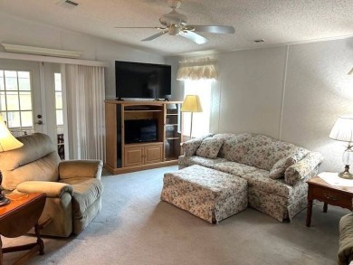 This beautifully maintained 2-bedroom, 2-bathroom home is being on Crystal Lake Club in Florida - for sale on GolfHomes.com, golf home, golf lot