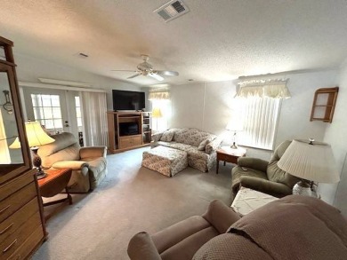 This beautifully maintained 2-bedroom, 2-bathroom home is being on Crystal Lake Club in Florida - for sale on GolfHomes.com, golf home, golf lot
