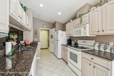 MOVE IN READY - PREMIER LOCATION - END UNIT - FURNISHED. Easiest on Heritage Pines Country Club in Florida - for sale on GolfHomes.com, golf home, golf lot
