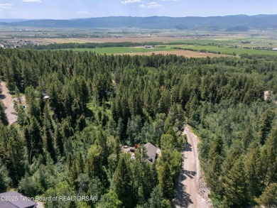 This beautifully treed half acre lot is just a short walking on Star Valley RV Golf Course in Wyoming - for sale on GolfHomes.com, golf home, golf lot