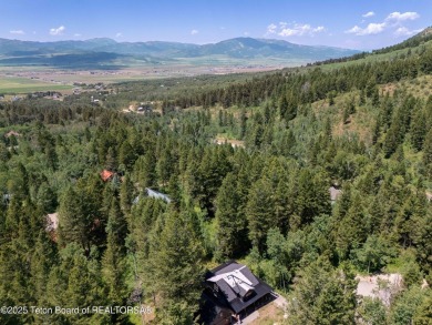 This beautifully treed half acre lot is just a short walking on Star Valley RV Golf Course in Wyoming - for sale on GolfHomes.com, golf home, golf lot