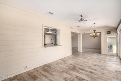 Discover Sun City Living in this charming 2-bed, 2-bath Gemini on Sun City Lakes West and East in Arizona - for sale on GolfHomes.com, golf home, golf lot