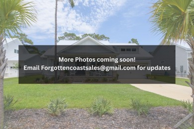 **INTERIOR PHOTOS TO COME-Tucked Away on Royal Tern Way - on St. James Bay in Florida - for sale on GolfHomes.com, golf home, golf lot
