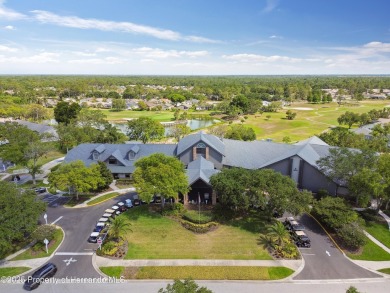 MOVE IN READY - PREMIER LOCATION - END UNIT - FURNISHED. Easiest on Heritage Pines Country Club in Florida - for sale on GolfHomes.com, golf home, golf lot