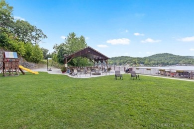 Situated in Camdenton, MO at the Lake of the Ozarks, and located on The Club At Old Kinderhook in Missouri - for sale on GolfHomes.com, golf home, golf lot