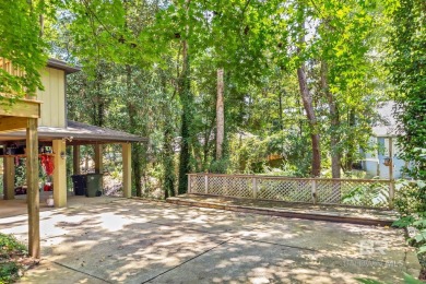 Welcome home to your private escape with your driveway Nestled on Lake Forest Yacht and Country Club in Alabama - for sale on GolfHomes.com, golf home, golf lot