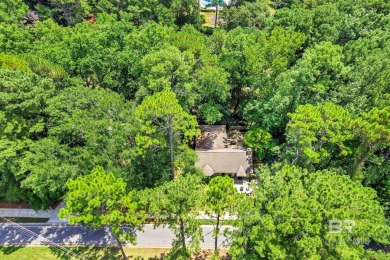 Welcome home to your private escape with your driveway Nestled on Lake Forest Yacht and Country Club in Alabama - for sale on GolfHomes.com, golf home, golf lot