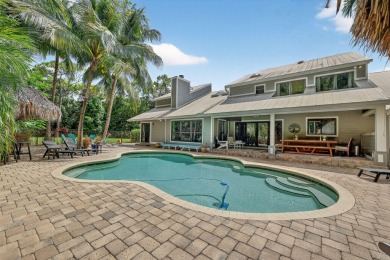 Live, work & play in your own tropical oasis! Nestled on over 1 on Martin Downs Country Club in Florida - for sale on GolfHomes.com, golf home, golf lot