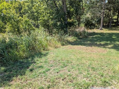 Ready for your dream home? This lot is a block from the Holiday on Holiday Island Executive Golf Course in Arkansas - for sale on GolfHomes.com, golf home, golf lot