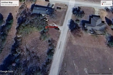 Ready for your dream home? This lot is a block from the Holiday on Holiday Island Executive Golf Course in Arkansas - for sale on GolfHomes.com, golf home, golf lot