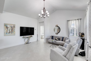 Charming Dreamsicle Cottage located in Latitude Daytona Beach on LPGA International Golf Course in Florida - for sale on GolfHomes.com, golf home, golf lot