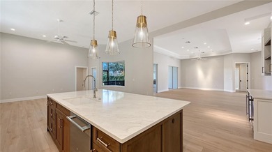 Built with exceptional craftsmanship, this Gary Stewart-designed on Laurel Oak Country Club in Florida - for sale on GolfHomes.com, golf home, golf lot