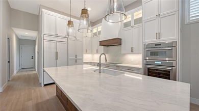 Built with exceptional craftsmanship, this Gary Stewart-designed on Laurel Oak Country Club in Florida - for sale on GolfHomes.com, golf home, golf lot