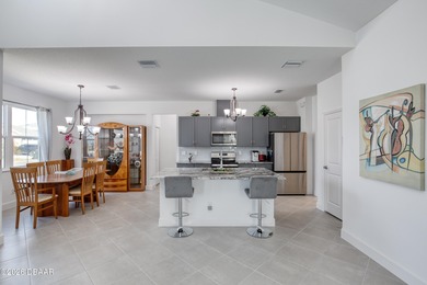 Charming Dreamsicle Cottage located in Latitude Daytona Beach on LPGA International Golf Course in Florida - for sale on GolfHomes.com, golf home, golf lot