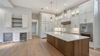 Built with exceptional craftsmanship, this Gary Stewart-designed on Laurel Oak Country Club in Florida - for sale on GolfHomes.com, golf home, golf lot