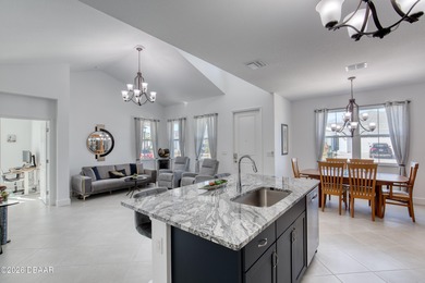 Charming Dreamsicle Cottage located in Latitude Daytona Beach on LPGA International Golf Course in Florida - for sale on GolfHomes.com, golf home, golf lot