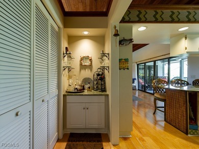 Welcome to 1379 Albatross Road, a private tropical retreat on The Dunes Golf and Tennis Club in Florida - for sale on GolfHomes.com, golf home, golf lot