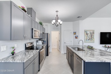 Charming Dreamsicle Cottage located in Latitude Daytona Beach on LPGA International Golf Course in Florida - for sale on GolfHomes.com, golf home, golf lot