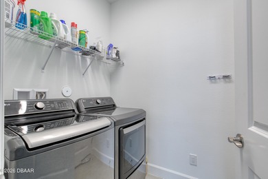 Charming Dreamsicle Cottage located in Latitude Daytona Beach on LPGA International Golf Course in Florida - for sale on GolfHomes.com, golf home, golf lot