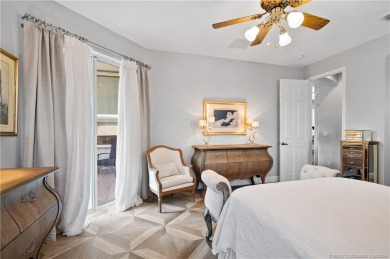 Timeless neoclassical home with modern renovations in the on Monarch Country Club in Florida - for sale on GolfHomes.com, golf home, golf lot