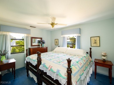 Welcome to 1379 Albatross Road, a private tropical retreat on The Dunes Golf and Tennis Club in Florida - for sale on GolfHomes.com, golf home, golf lot