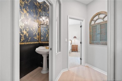 Timeless neoclassical home with modern renovations in the on Monarch Country Club in Florida - for sale on GolfHomes.com, golf home, golf lot