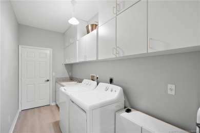 Timeless neoclassical home with modern renovations in the on Monarch Country Club in Florida - for sale on GolfHomes.com, golf home, golf lot