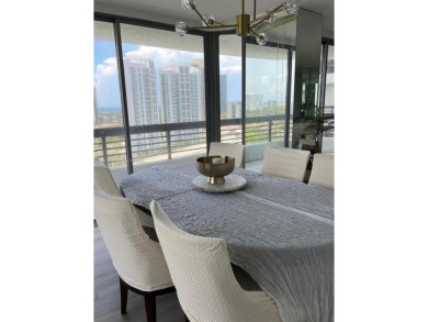This elegant and bright corner 2-bedroom, 2-bath condo features on Turnberry Isle Resort and Club in Florida - for sale on GolfHomes.com, golf home, golf lot