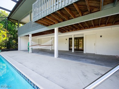 Welcome to 1379 Albatross Road, a private tropical retreat on The Dunes Golf and Tennis Club in Florida - for sale on GolfHomes.com, golf home, golf lot