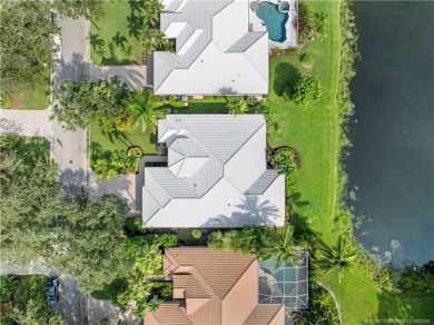 Timeless neoclassical home with modern renovations in the on Monarch Country Club in Florida - for sale on GolfHomes.com, golf home, golf lot