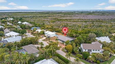 Welcome to 1379 Albatross Road, a private tropical retreat on The Dunes Golf and Tennis Club in Florida - for sale on GolfHomes.com, golf home, golf lot