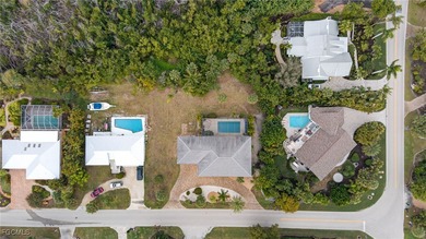 Welcome to 1379 Albatross Road, a private tropical retreat on The Dunes Golf and Tennis Club in Florida - for sale on GolfHomes.com, golf home, golf lot