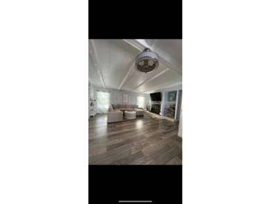 This home is located inside the beautiful 55 Plus Gated Golf on Lake Fairways Country Club in Florida - for sale on GolfHomes.com, golf home, golf lot