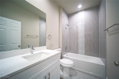 BRAND NEW CONSTRUCTION ON A 1/2 Acre Lot With A Fenced-In Back on Lehigh Resort Club in Florida - for sale on GolfHomes.com, golf home, golf lot