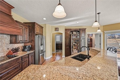 Experience the perfect blend of luxury and leisure in this on Staley Farms Golf Club in Missouri - for sale on GolfHomes.com, golf home, golf lot