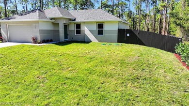 BRAND NEW CONSTRUCTION ON A 1/2 Acre Lot With A Fenced-In Back on Lehigh Resort Club in Florida - for sale on GolfHomes.com, golf home, golf lot