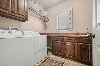 Experience the perfect blend of luxury and leisure in this on Staley Farms Golf Club in Missouri - for sale on GolfHomes.com, golf home, golf lot